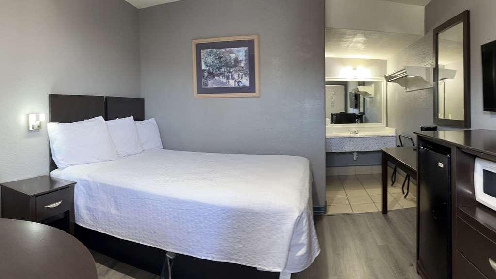 Americas Best Value Inn And Suites Groves Стая снимка