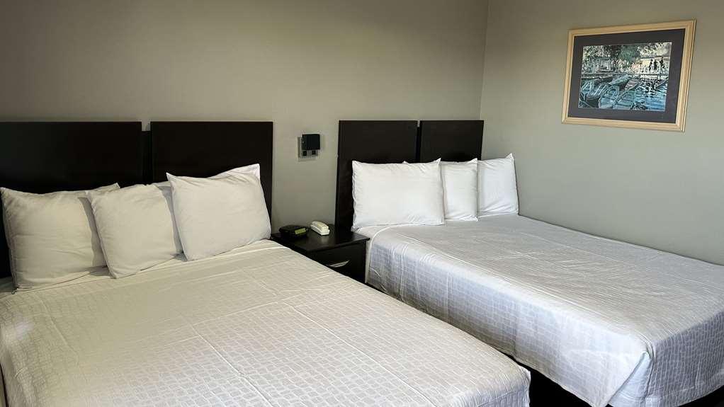 Americas Best Value Inn And Suites Groves Стая снимка