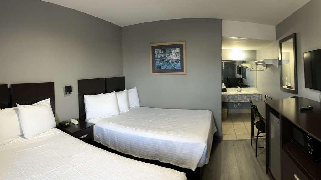 Americas Best Value Inn And Suites Groves Стая снимка