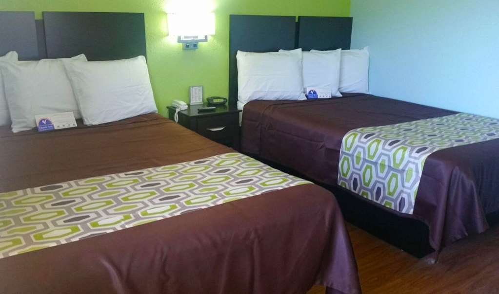 Americas Best Value Inn And Suites Groves Стая снимка